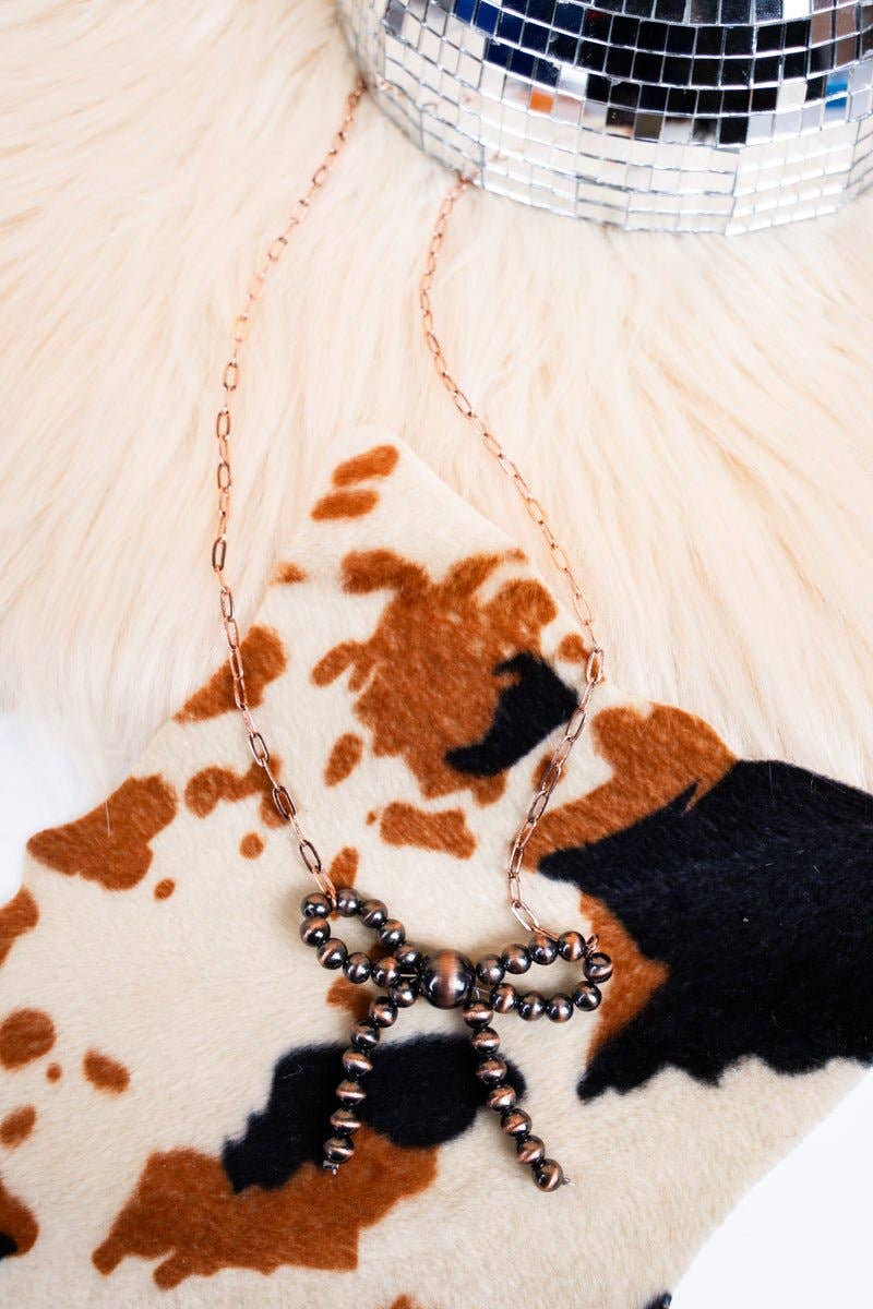 Emmeline Copper Pearl Bow Necklace