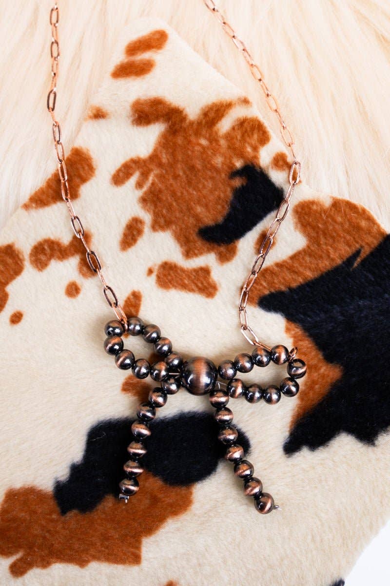 Emmeline Copper Pearl Bow Necklace